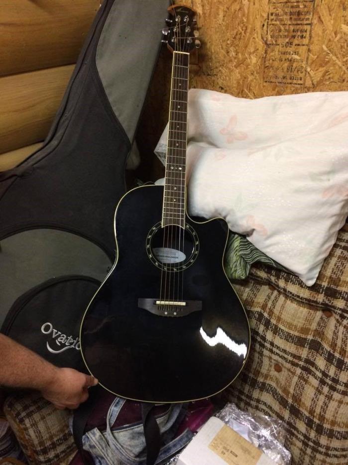 6 string black ovation guitar acoustic/electric excellent condition