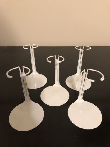 5 small doll stands