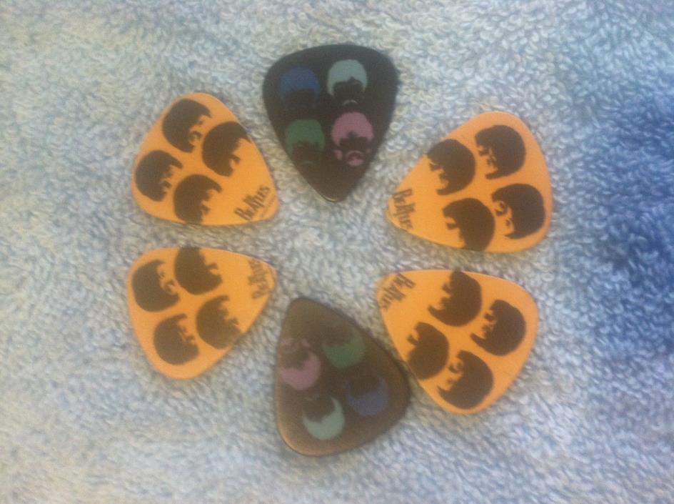 6 Beatles Guitar Picks collecting or playing MP 006