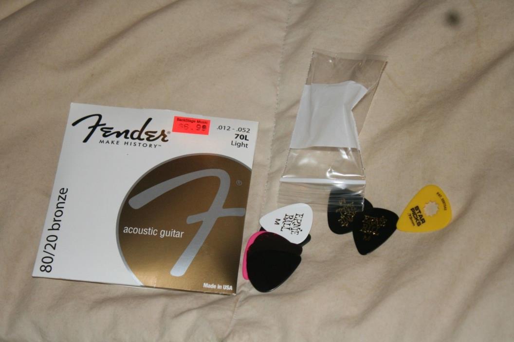 new 80/20 bronze fender guitar strings 70L and 10 guitar picks