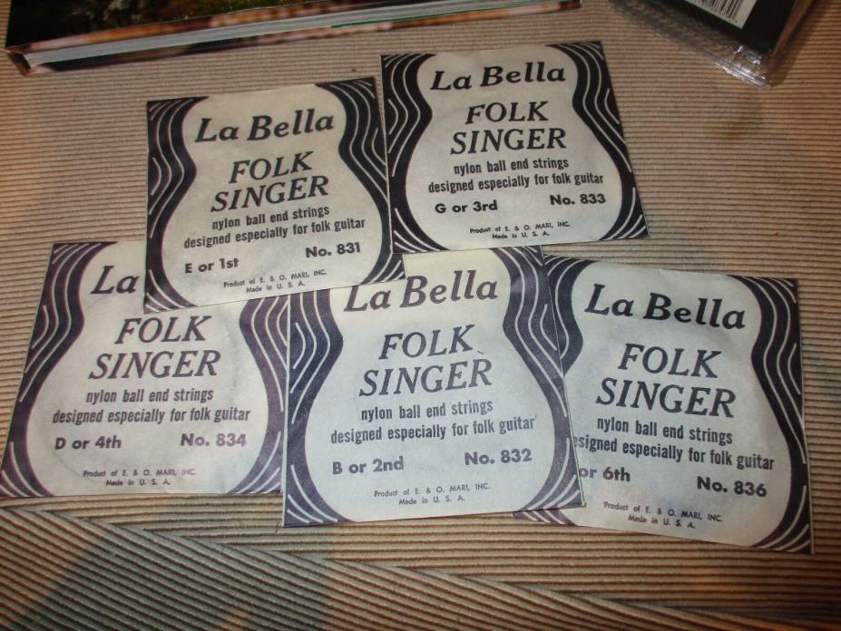 Five Different La Bella Folk Singer nylon ball end strings Made in USA and pick