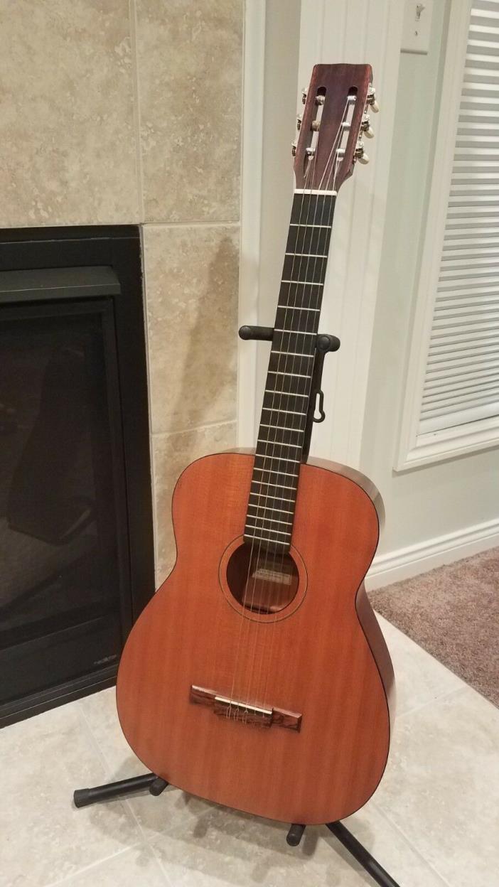 1966 Harmony H173 nylon string guitar and case.