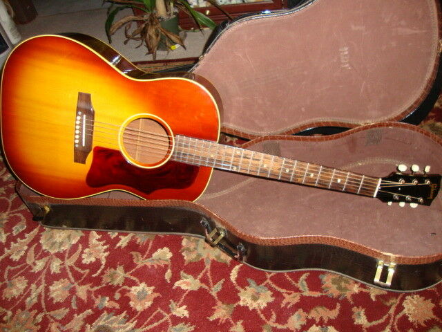 Gibson LG1 Acoustic guitar 1965 model with a new hard shell case