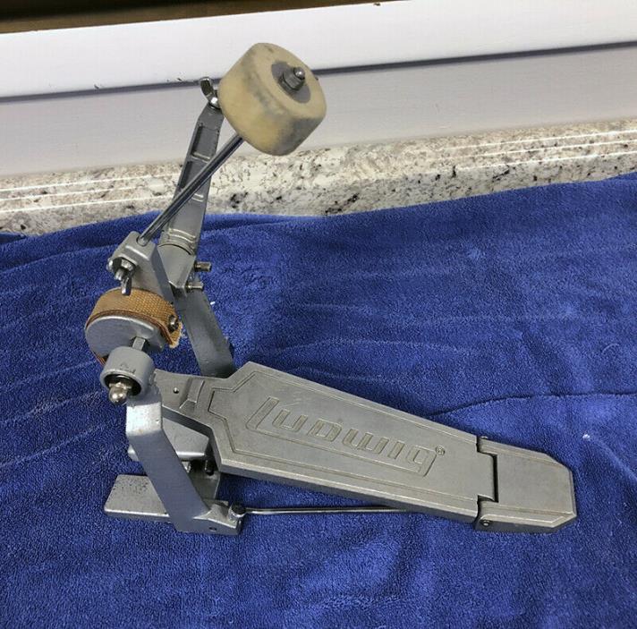 Vintage Ludwig single bass pedal. Looks and works great. Came with Rockers kit