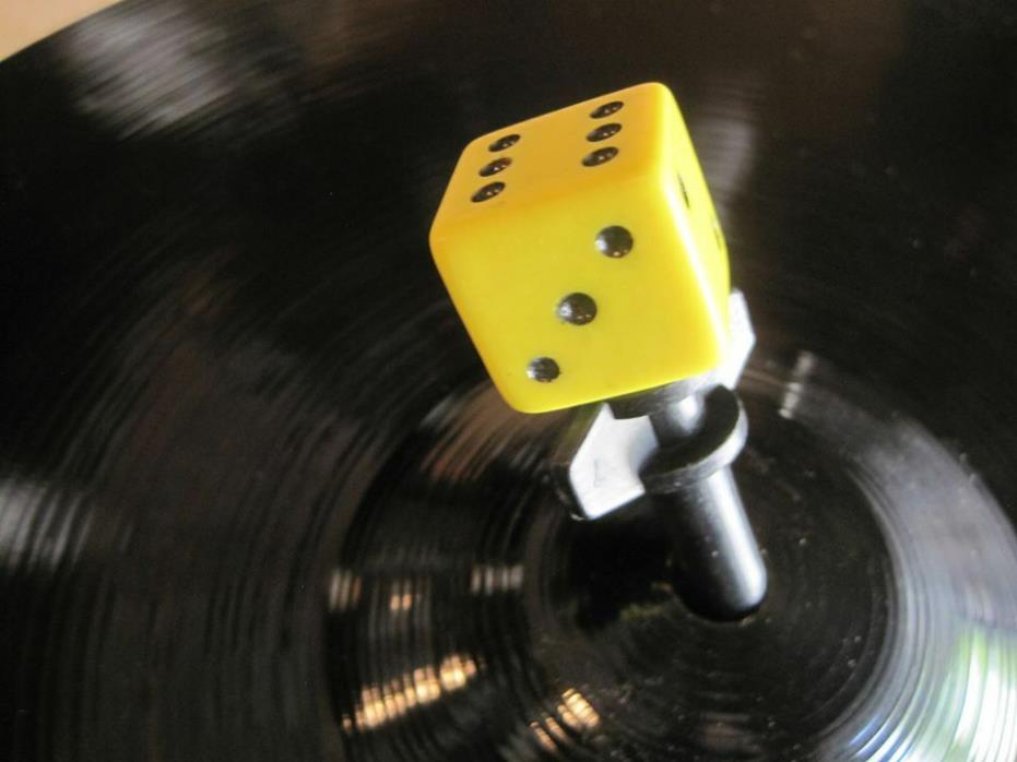 Cool Dice cymbal stand toppers . Protect your valuable cymbals from Key holing