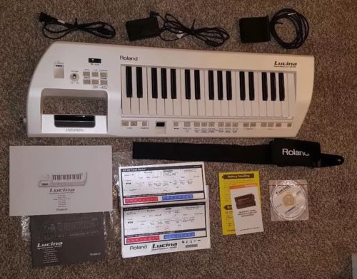 ROLAND LUCINA AX-09 Synthesizer Keytar White with a foot pedal *Great Condition