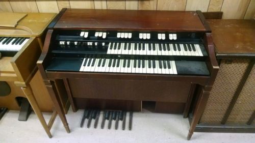 Two Antique Hammond Organs with tone cabinet and three foot key notes