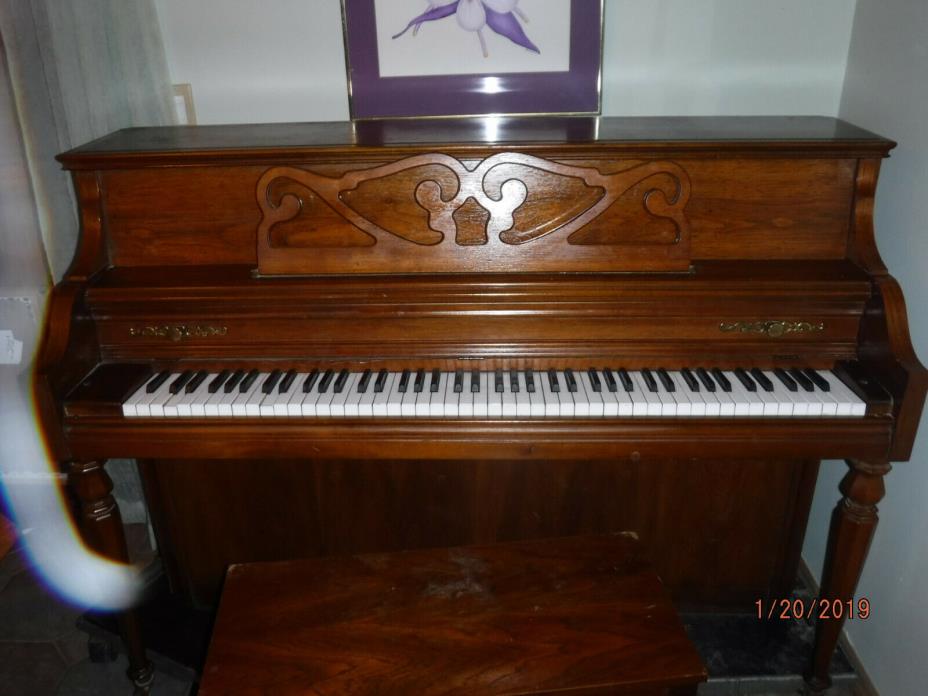 Kimball vertical console piano. 42