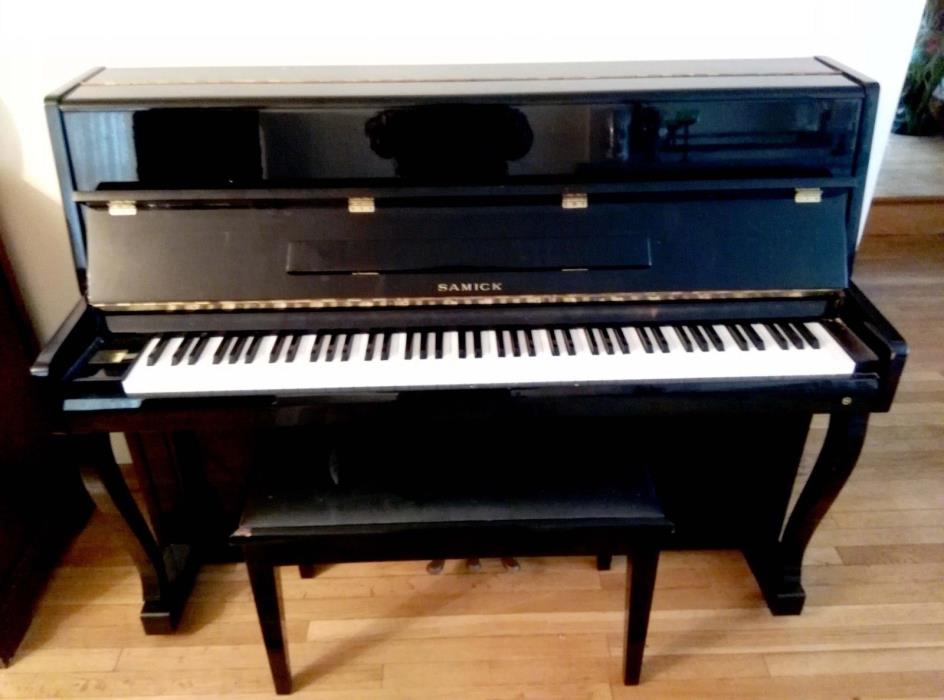 Black Lacquer Samick Upright Piano w/ matching bench slightly used 1 owner