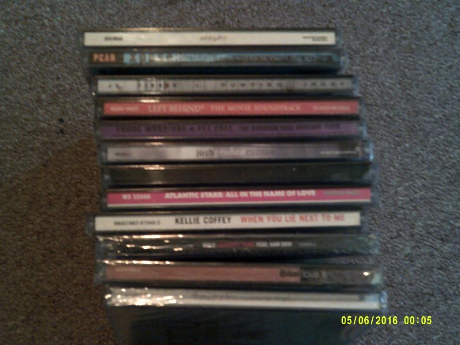 12 cd lot..3 three still in wrap  see pic....some good ones..