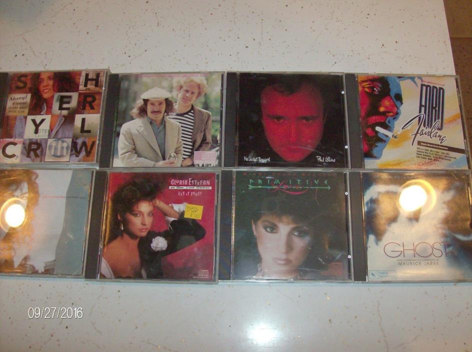 Lot of 8 CDs, 70's, 80's , Sheryl Crow, Simon and Garfunkel, Gloria Estefan....
