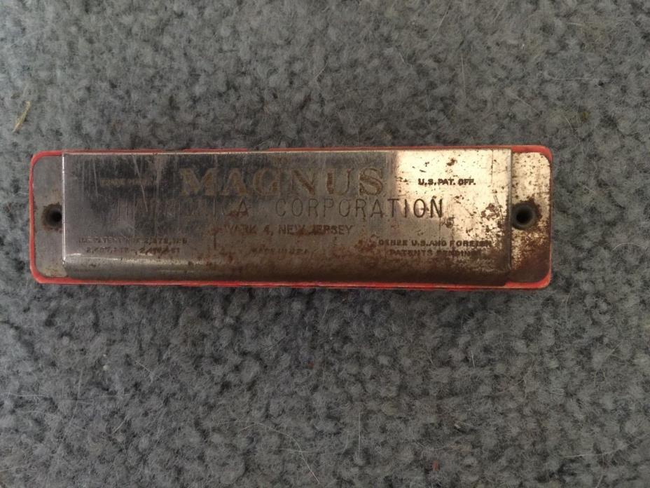 Vintage Magnus harmonica w/ Indian Chief on one side