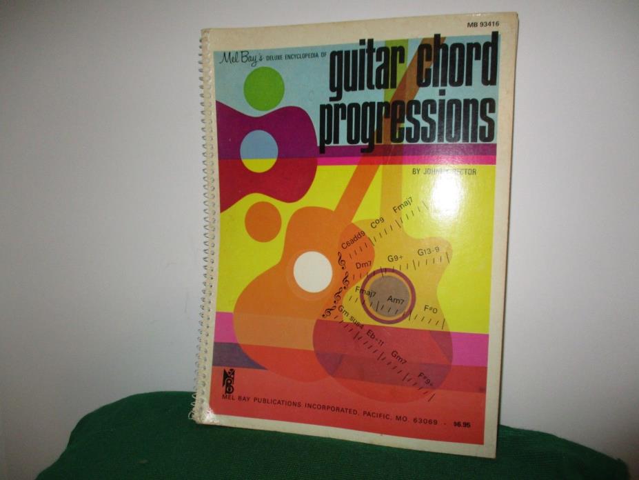 Vintage Mel Bay's Deluxe Encyclopedia of guitar chord progressions by Johnny Rec