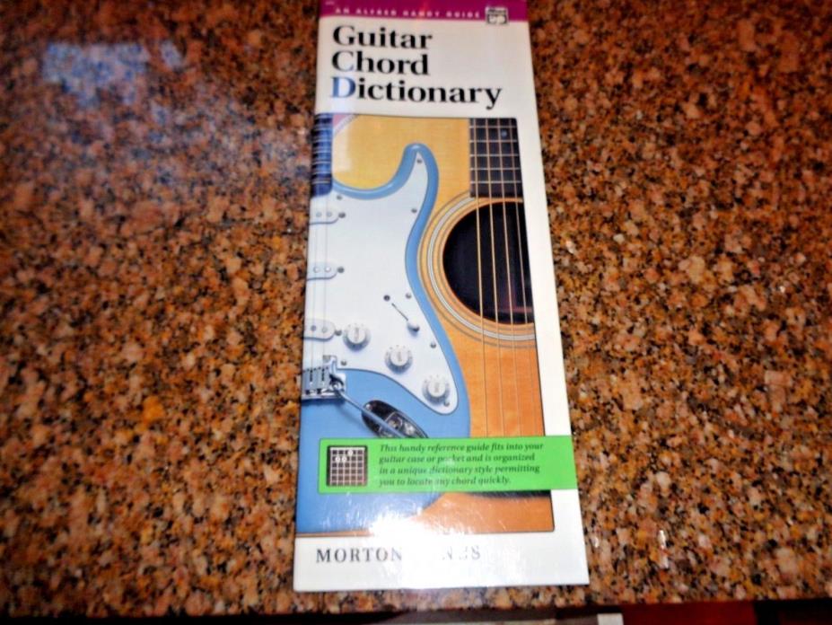 GUITAR CHORD DICTIONARY & THE GUITARIST'S PICTURE CHORDS BY  HAPPY TRAUM + SOLO