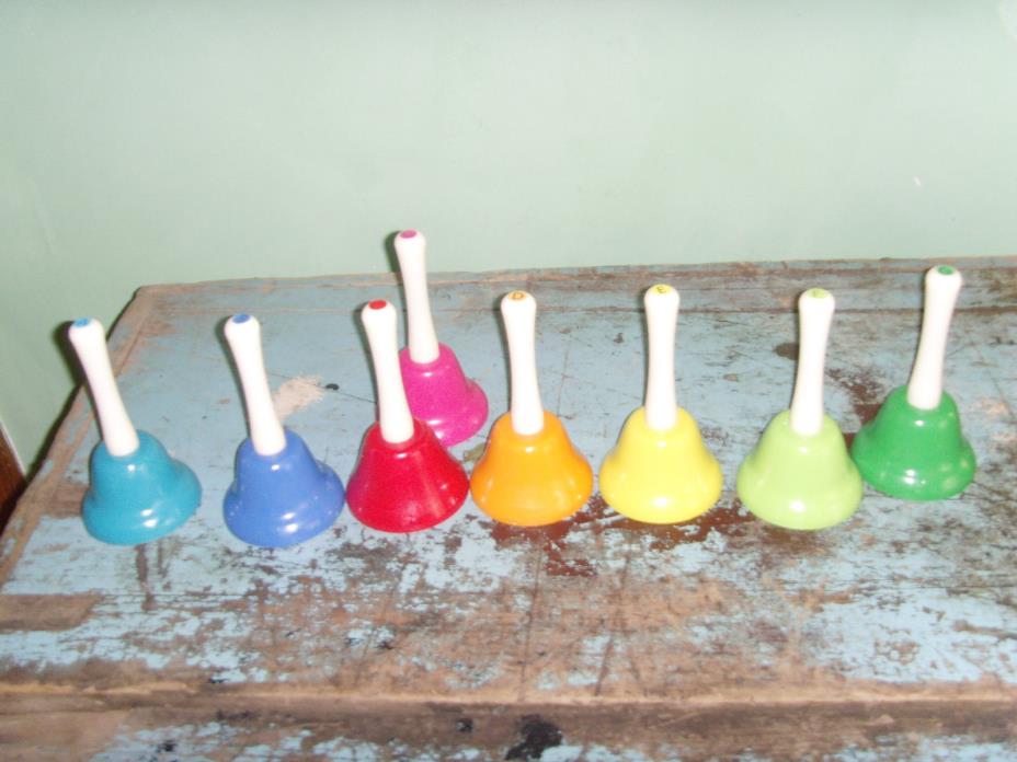 Lot of bright colored Montessori School Bells for education musical music kids