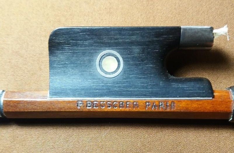 French violin bow stamped P.BEUSCHER PARIS silver mounted by MORIZOT Freres