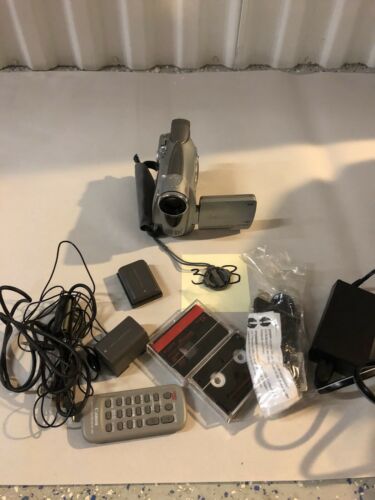 Canon ZR200 Mini DV Camcorder Bundle with, tape, battery, remote, and more