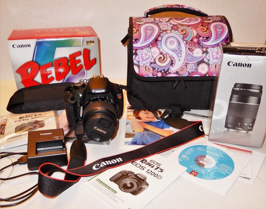 NEW CANON REBEL & $200 extra NEW LENS PLUS CASE & ALL MANUALS HUGE LOT ALL NEW