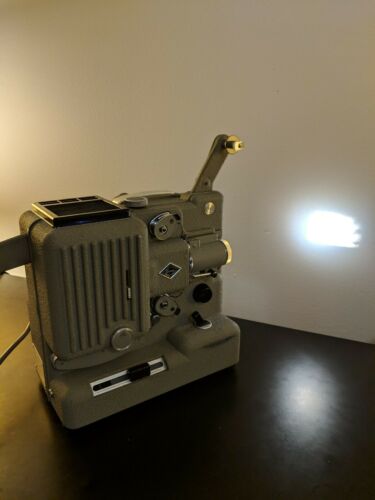 EUMIG IMPERIAL P8 8mm MOVIE PROJECTOR with original case, manual, reel. VG+.