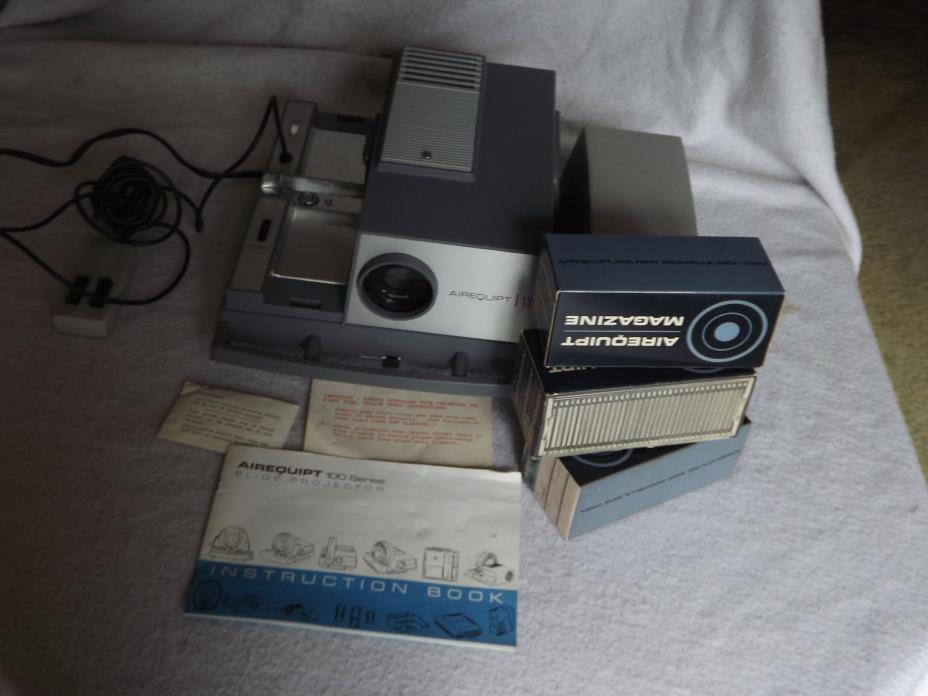 Airequipt 135 Series Slide Projector in box with 3 magazines VERY NICE
