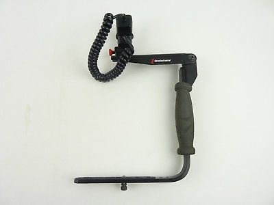 Canon OEM Off-Camera Shoe Cord 2 and Stroboframe for strobe light