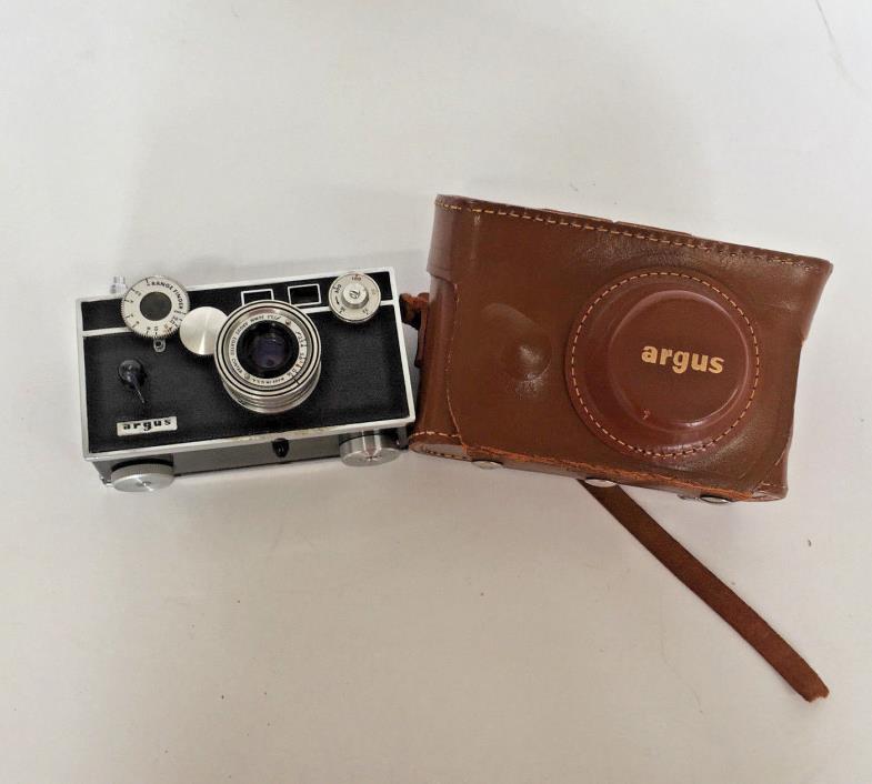 argus range finder camera and case  sold as is for parts display photo prop