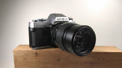 Minolta X-370 camera & 1:2.8 f=135 lens.. lights ,shutter ,timer & flash work!!