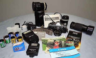 Vtg Canon AE-1 Program SLR 35mm Camera w/ 4 Lenses Film Lens Hood Flashes Lot