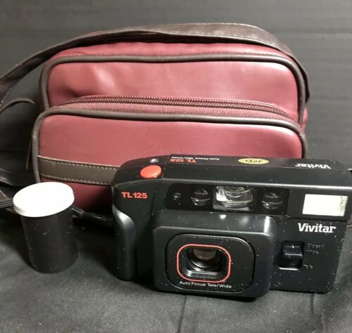 Vivitar TL125 35mm Camera With 2 Rolls Of Film, Batteries, and Case
