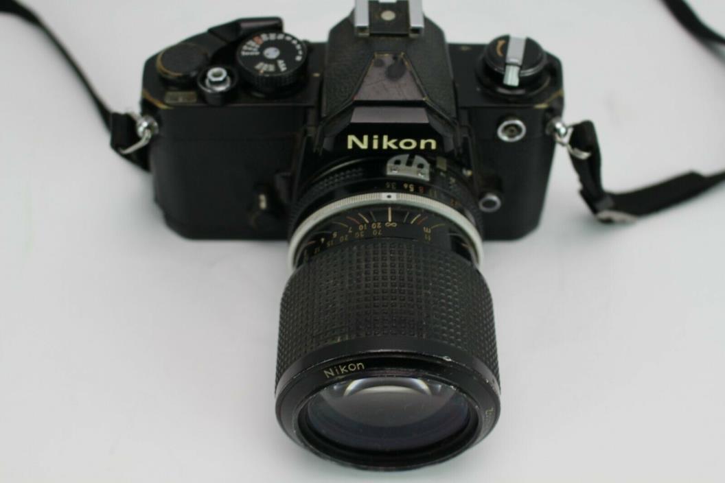 Vintage Nikon FM 35mm SLR Film Camera with Nikkor Zoom 43-86mm Lens and Case