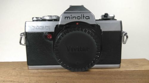 Minolta XG 7 camera. Timer and shutter works. For parts!