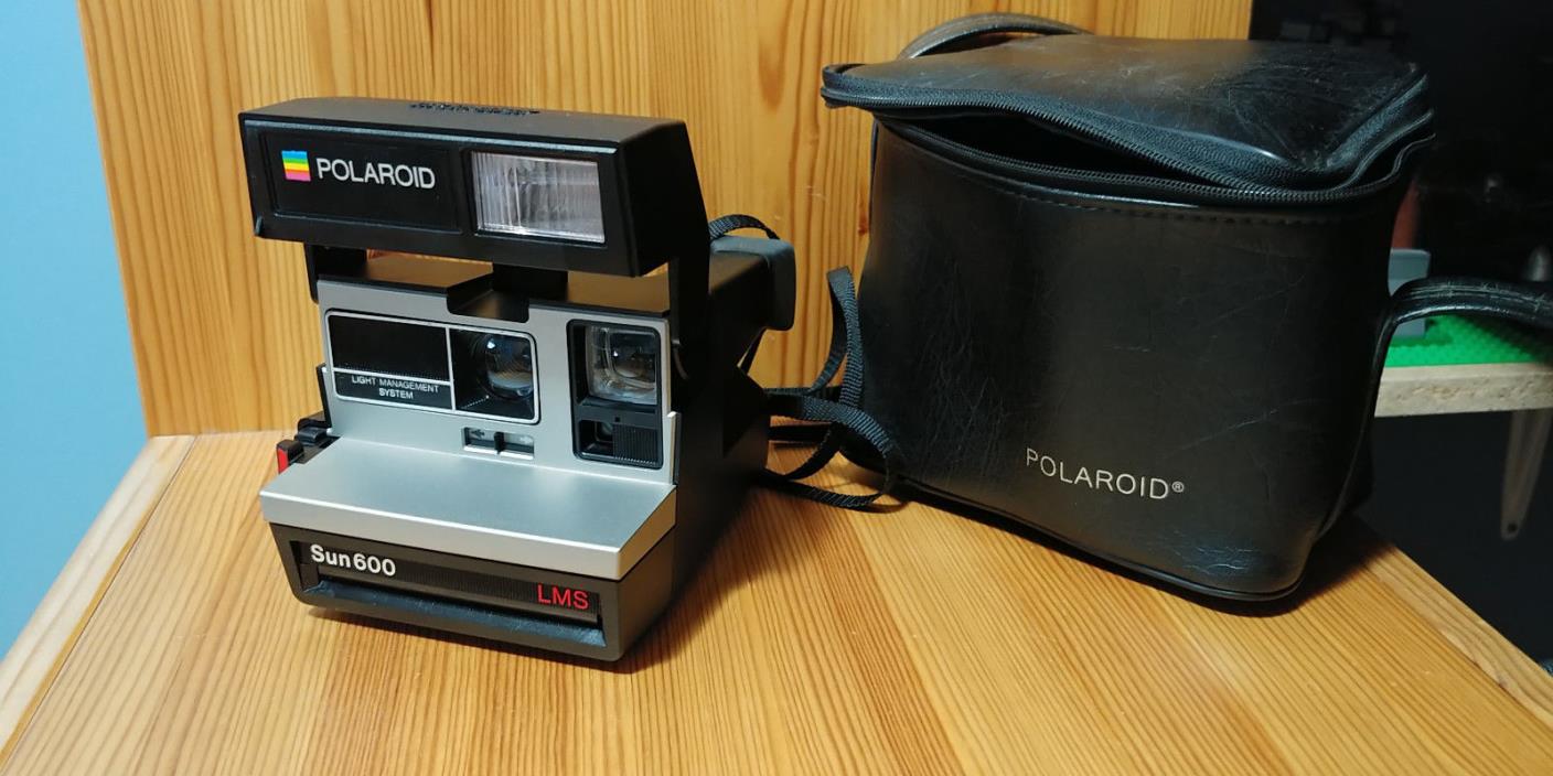 Polaroid Sun 600 LMS Instant Film Camera, W/ Strap and Leather Case, Very Good