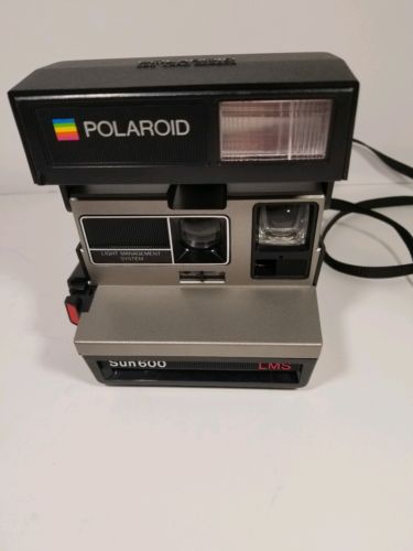 Polaroid Sun 600 LMS Light Management System Instant Camera Untested Book