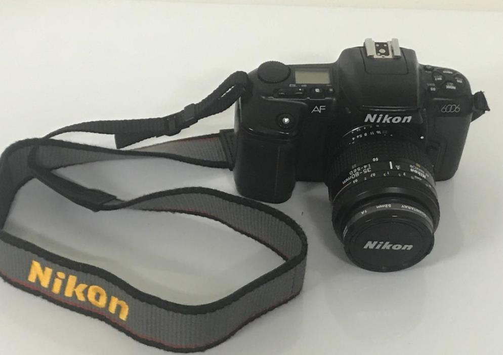 Nikon SLR  N6006 AF Camera And  With Nikon 35-80 Zoom Lens And Accessories .