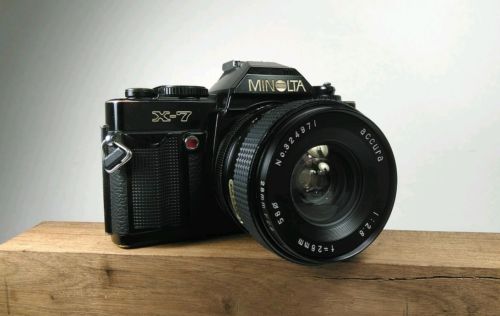 Minolta X-7 camera & Accura 1:2.8 f=28mm. Light, shutter and timer work!!