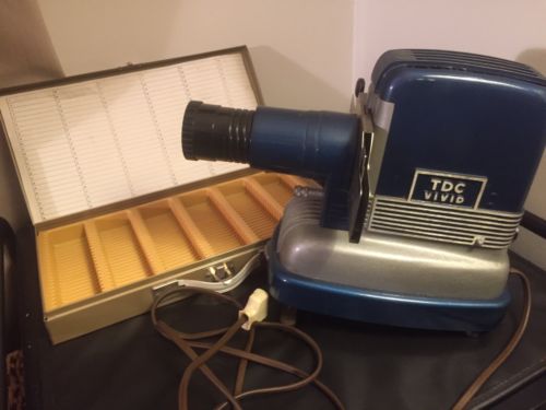 Vintage TDC Vivid Mainliner 300 Slide Projector with slide case (no slides).