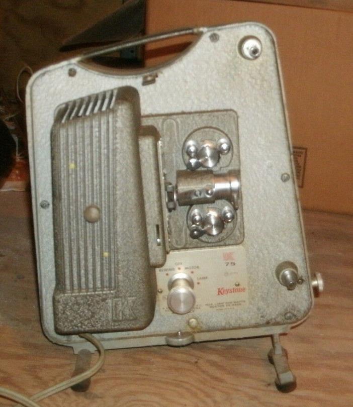 Keystone vintage movie projector with a screen from Radient