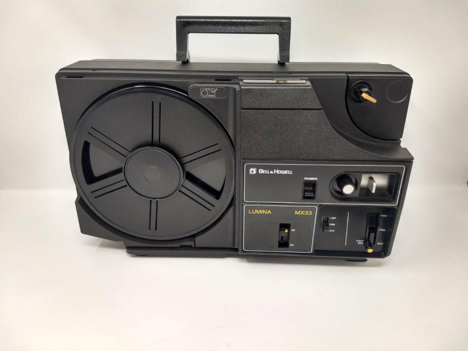 WORKING BELL & HOWELL DUAL 8mm PROJECTOR LUMINA MX33 for parts or repair