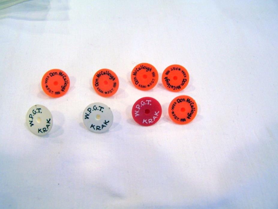8 golf ball tee markers, 5 Don McCullough 1986, 3 WPGT Krak
