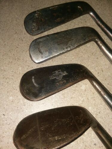 Four Antique Wooden Shafted irons