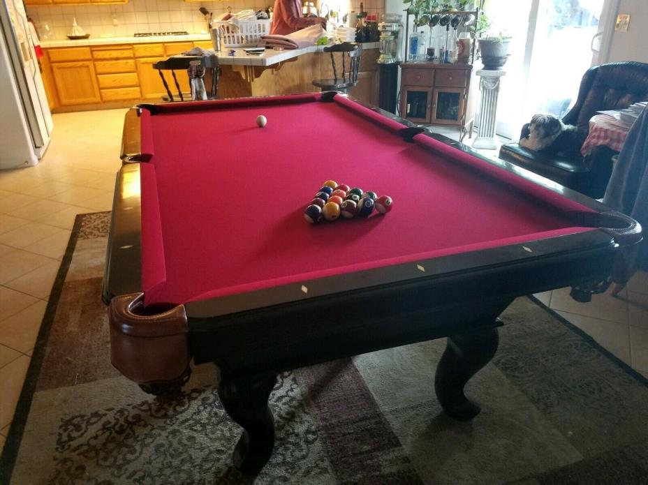 Standard home 8' foot pool table, new red felt, leather pockets