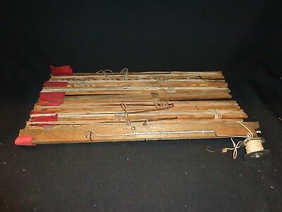 Set of 8 Vintage Tilt-Up Wood Ice Fishing Poles with Flags, 1 with Spool