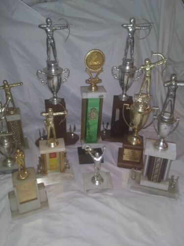 Collection of 10 vintage mens archery trophies