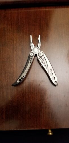 LEATHERMAN FREESTYLE KEY CHAIN MULTI-TOOL VERY GOOD CONDITION  pocket or purse