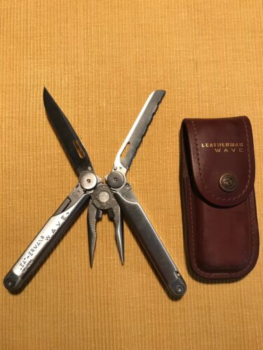 New, Pre-Owned, Retired Original 1999 Leatherman Wave with Leather Sheath