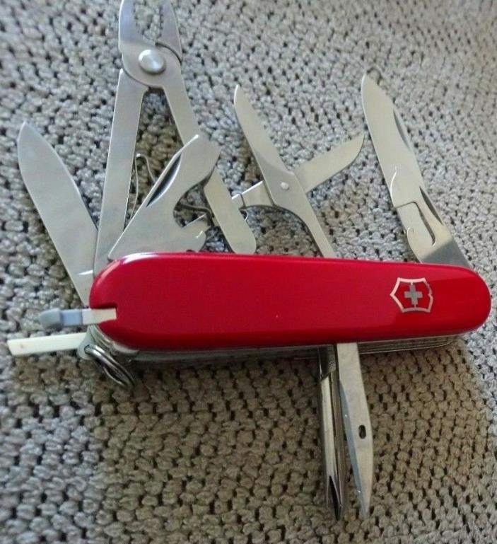 Victorinox Officier Suisse, Swiss Army Knife, 10-Multi, Leather Case, 30+ Years