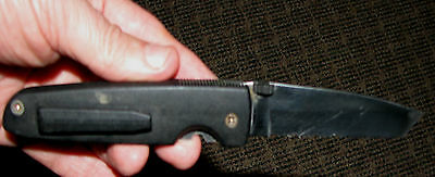 Locking blade knife, w part serated blade, stainless blade made by Sharp Eagle
