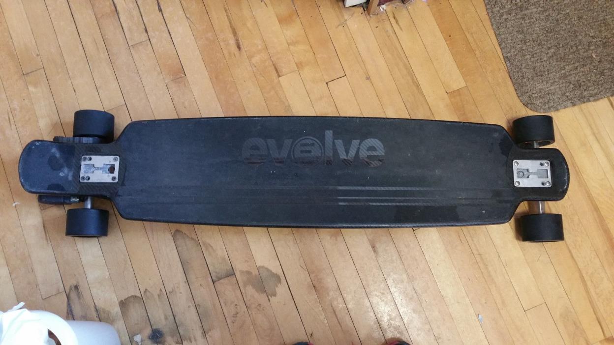 Evolve Carbon Fiber Gen 2 Electric Skateboard with remote and charger