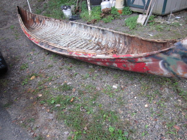 Vintage Wood Canvas Canoe