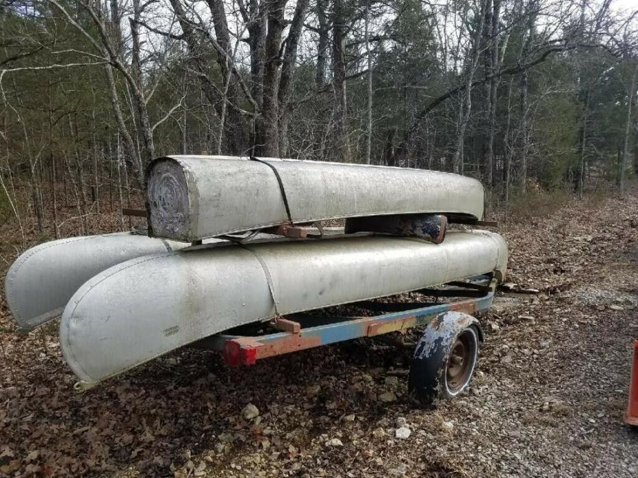 Three 17 Foot Vintage Aluminum Canoes with trailer